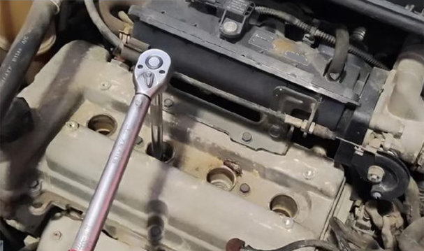 use a calibrated torque wrench, thoroughly clean the spark plug wells before removal