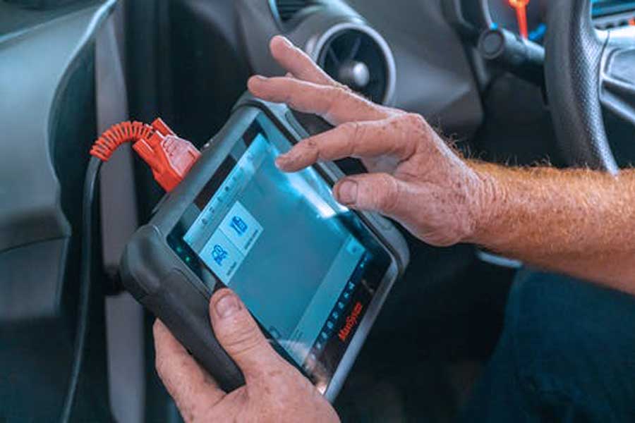 connect an OBD-II scan tool to read Diagnostic Trouble Codes (DTCs)