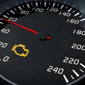 Why Did the Check Engine Light Turn On After Replacing Spark Plugs?